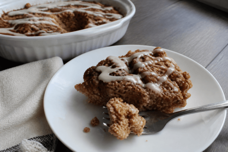 Cinnamon roll baked oatmeal with cream cheese drizzle